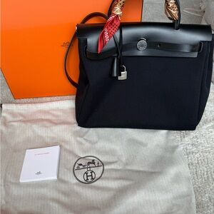 Hermes Black Crossbody Bag with Red Accent